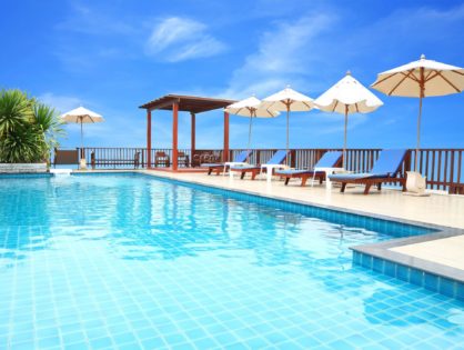 Pool with deck chairs